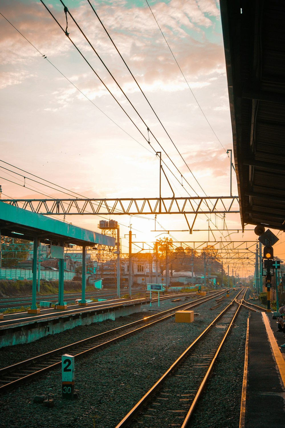 train station under white clouds during daytime