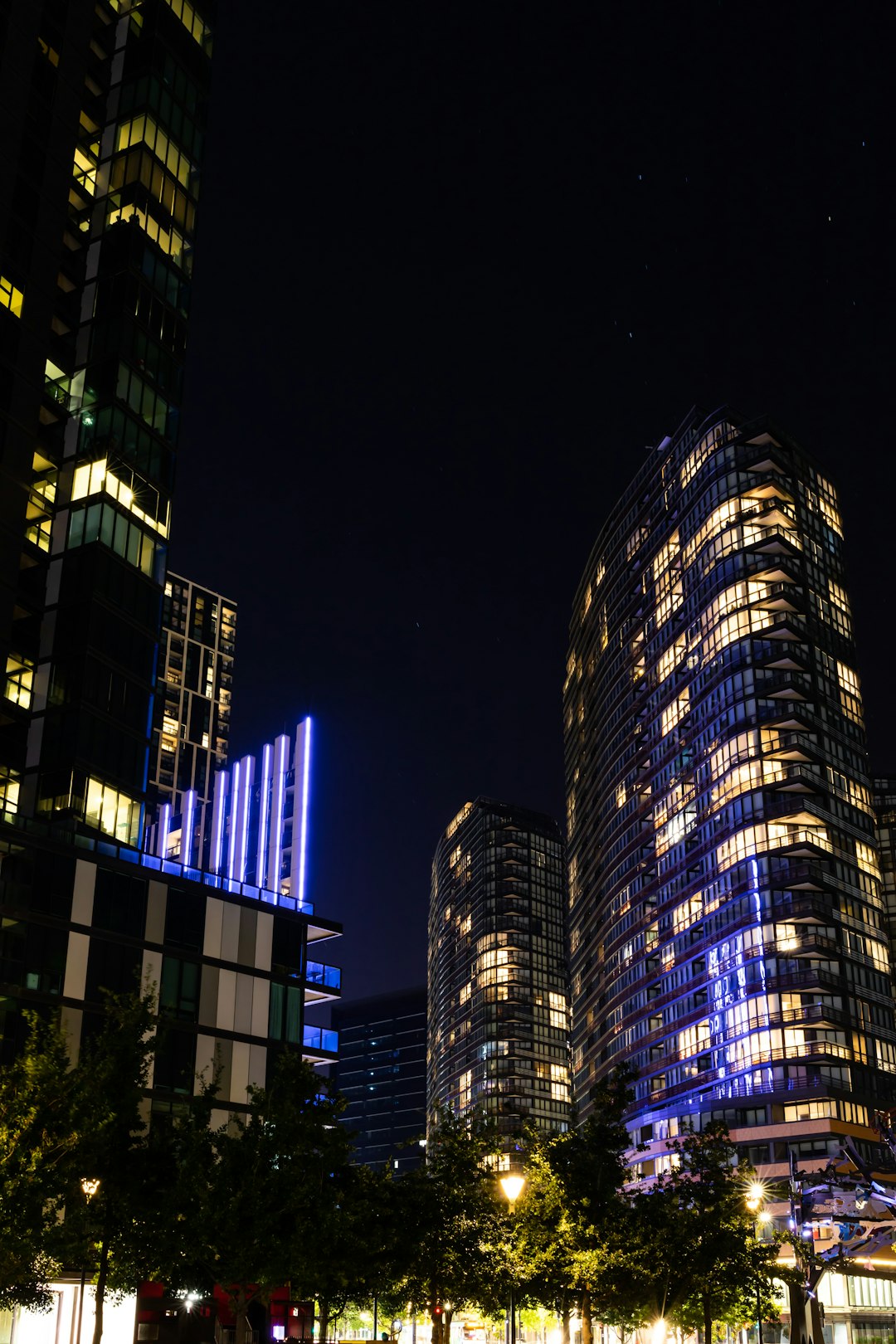 blue and black high rise building during nighttime