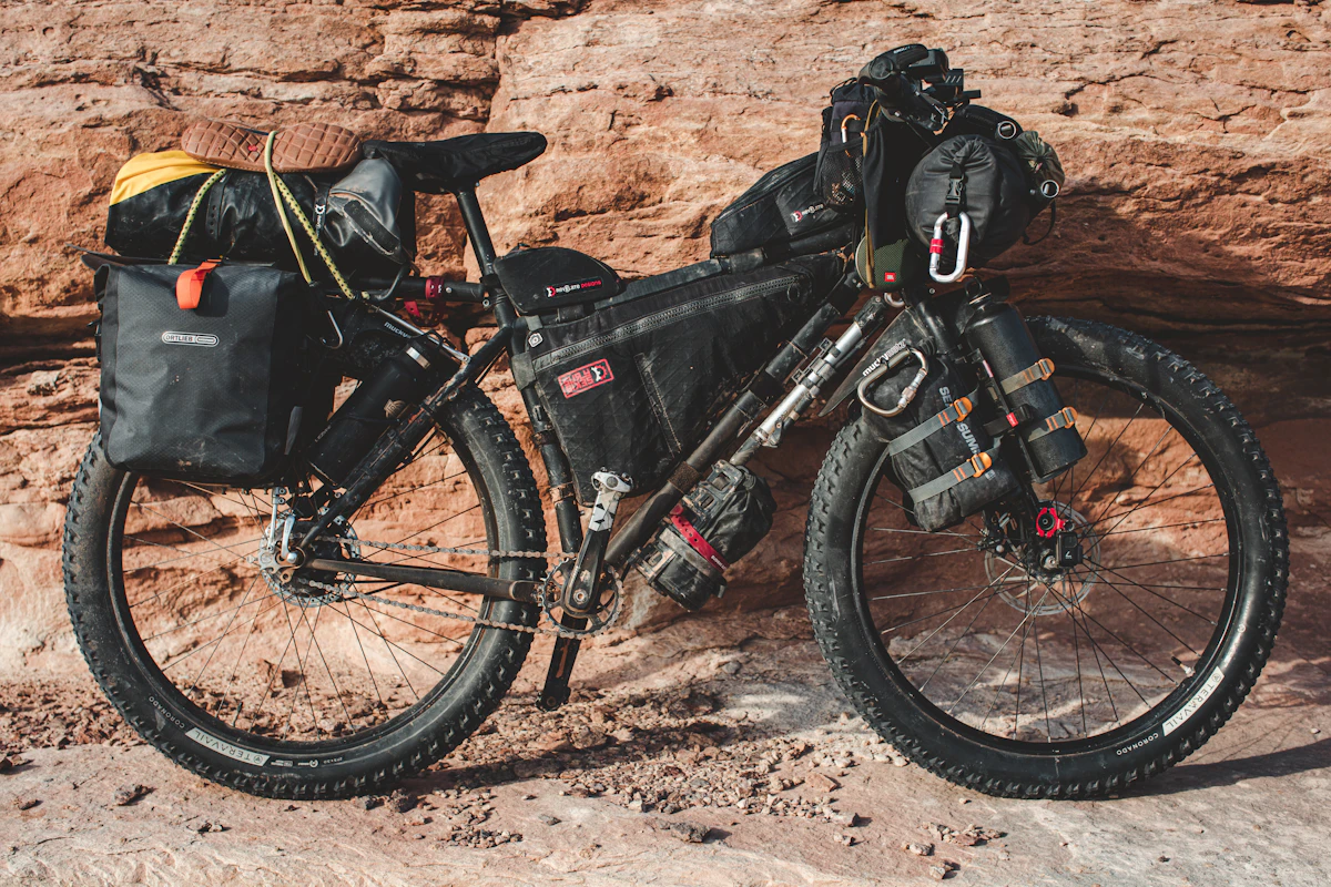 Loaded mountain bike on a bikepacking trip along the Green River in Utah