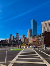 brown and white concrete buildings under blue sky during daytime
