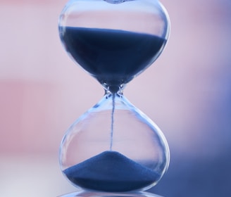 an hourglass sitting on top of a table