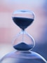 an hourglass sitting on top of a table