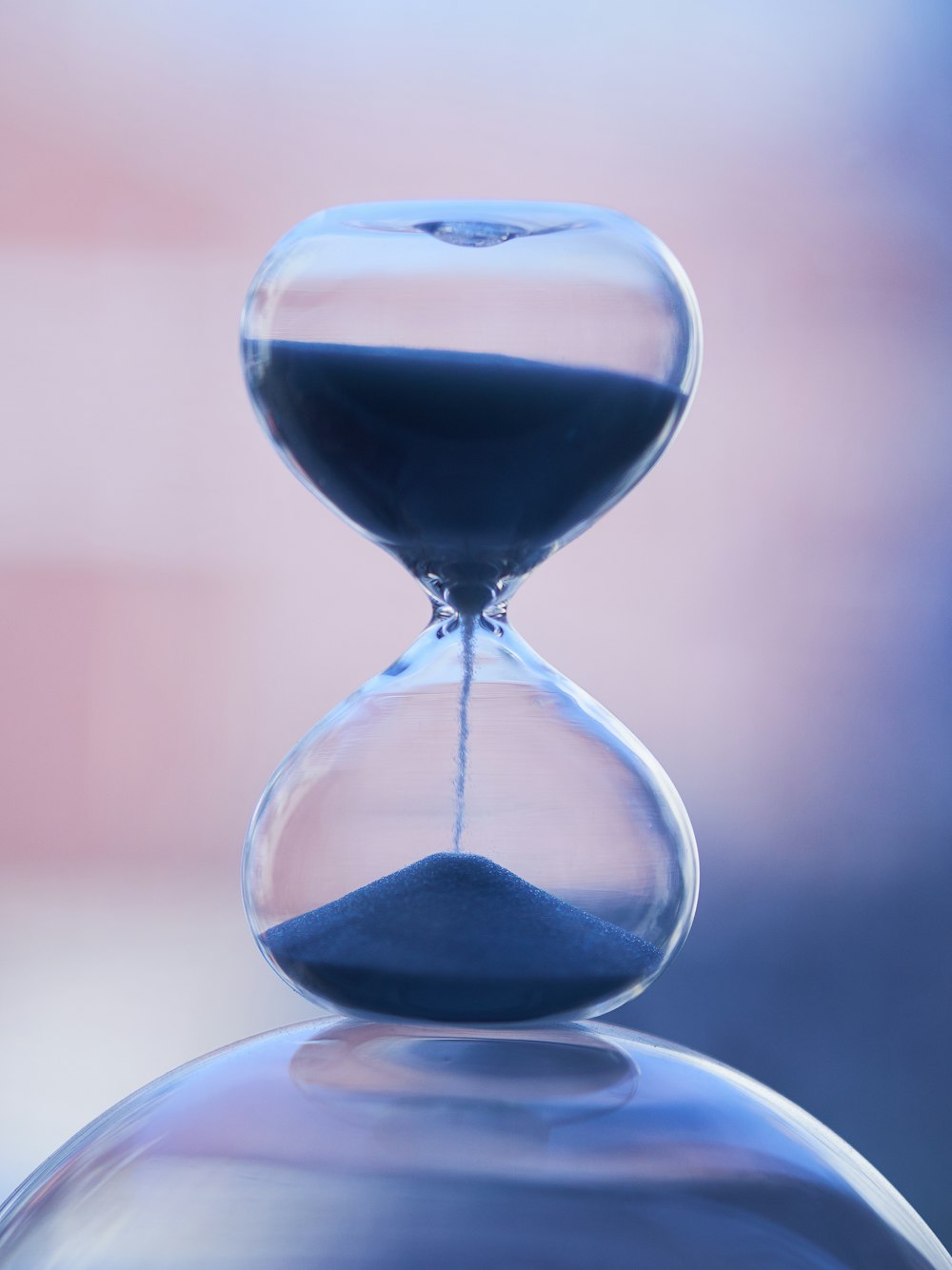 an hourglass sitting on top of a table