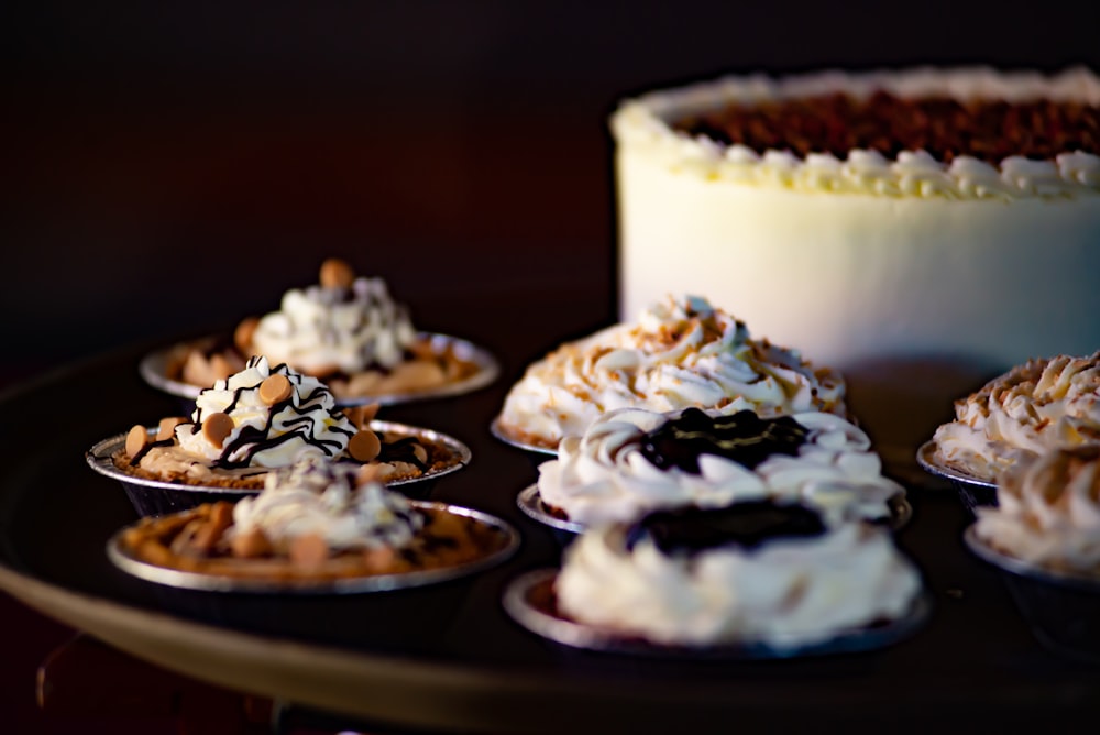 white ceramic plate with chocolate and white icing