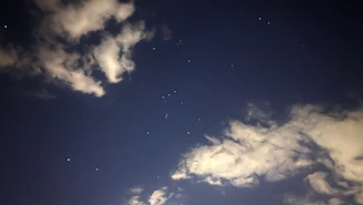 Mystical night sky with zodiac constellations glowing softly