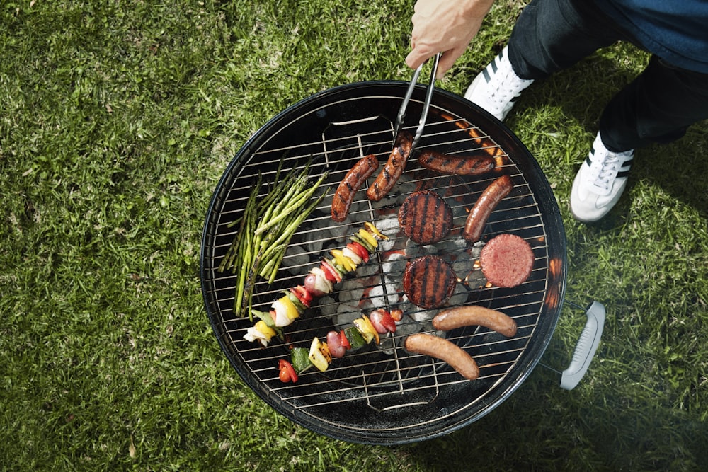 grilled meat on black round charcoal grill