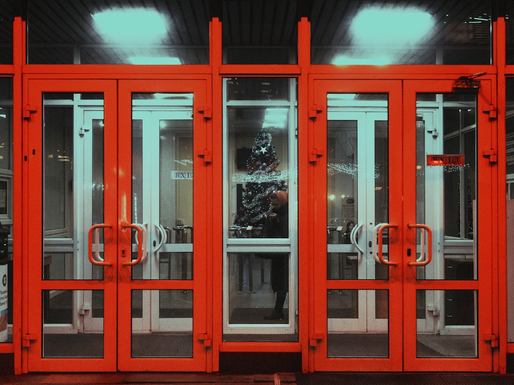 brown wooden framed glass door