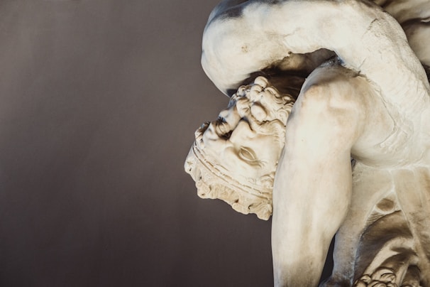 A classic sculpture made of marble, depicting a historical figure.
