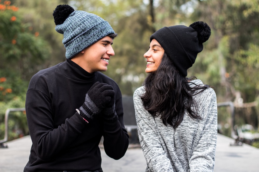 woman in black and gray knit cap and gray sweater