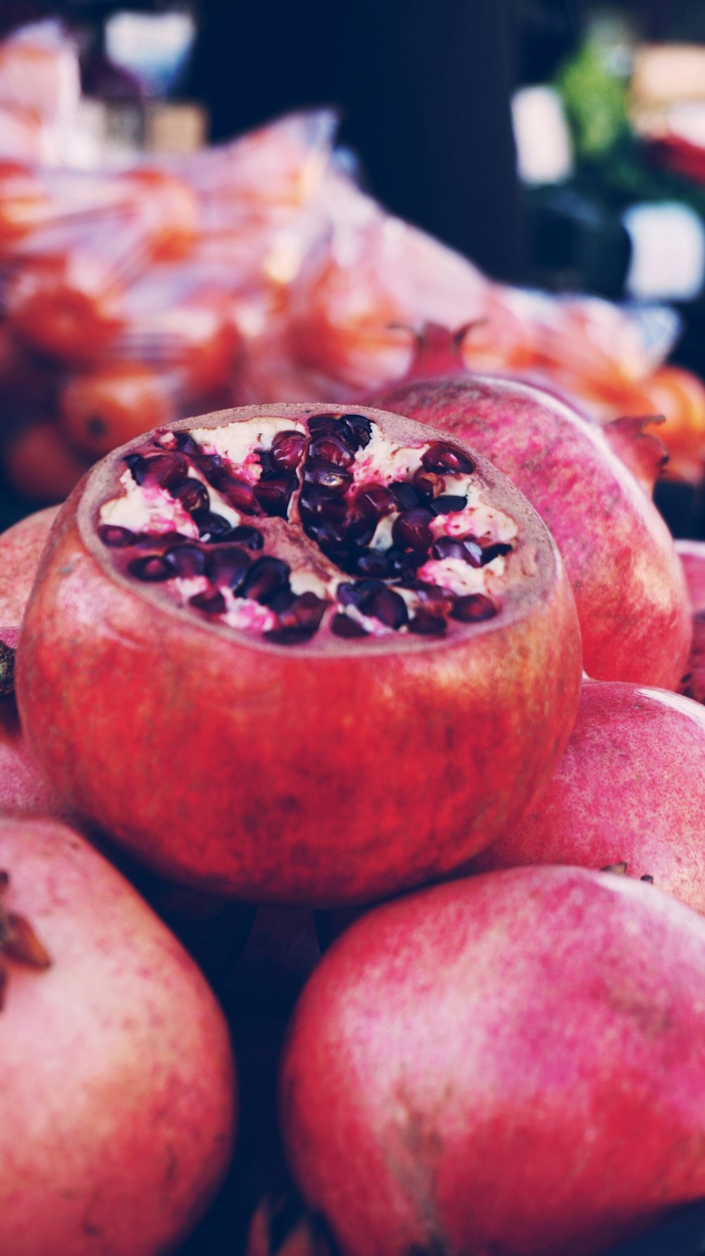 red round fruit in close up photography