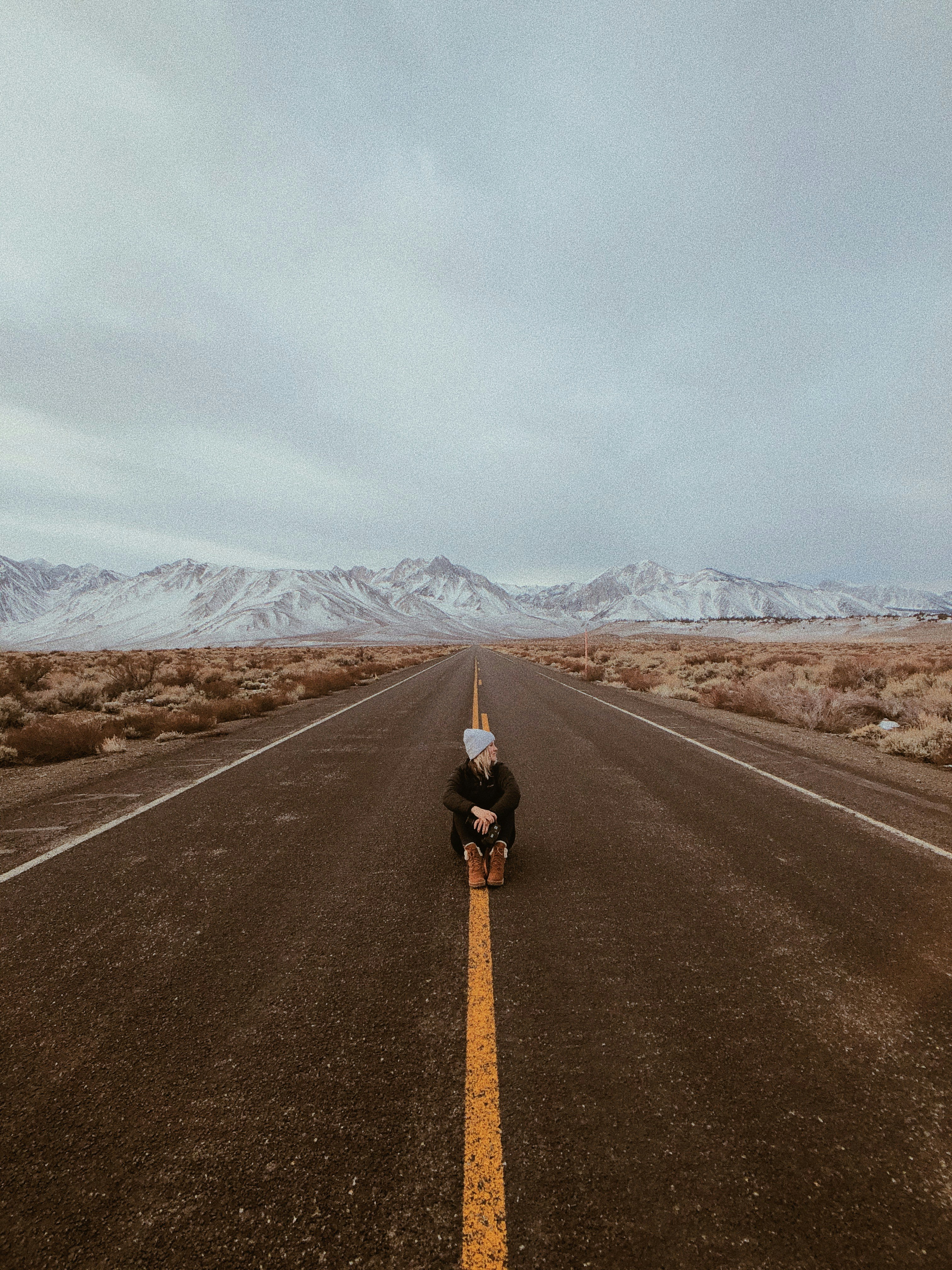 man in black jacket riding motorcycle on road during daytime