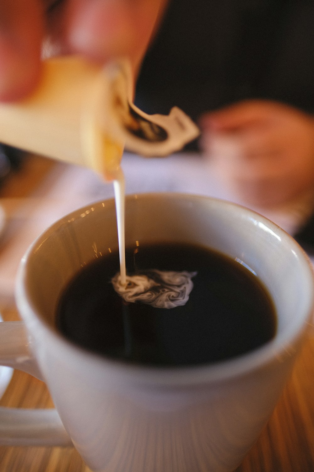 white ceramic mug with coffee