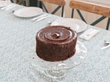 chocolate cake on white table cloth