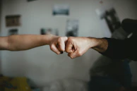 Close-up of hands shaking in agreement symbolizing trust and partnership.