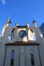 A collage of historical church buildings from different eras and regions.