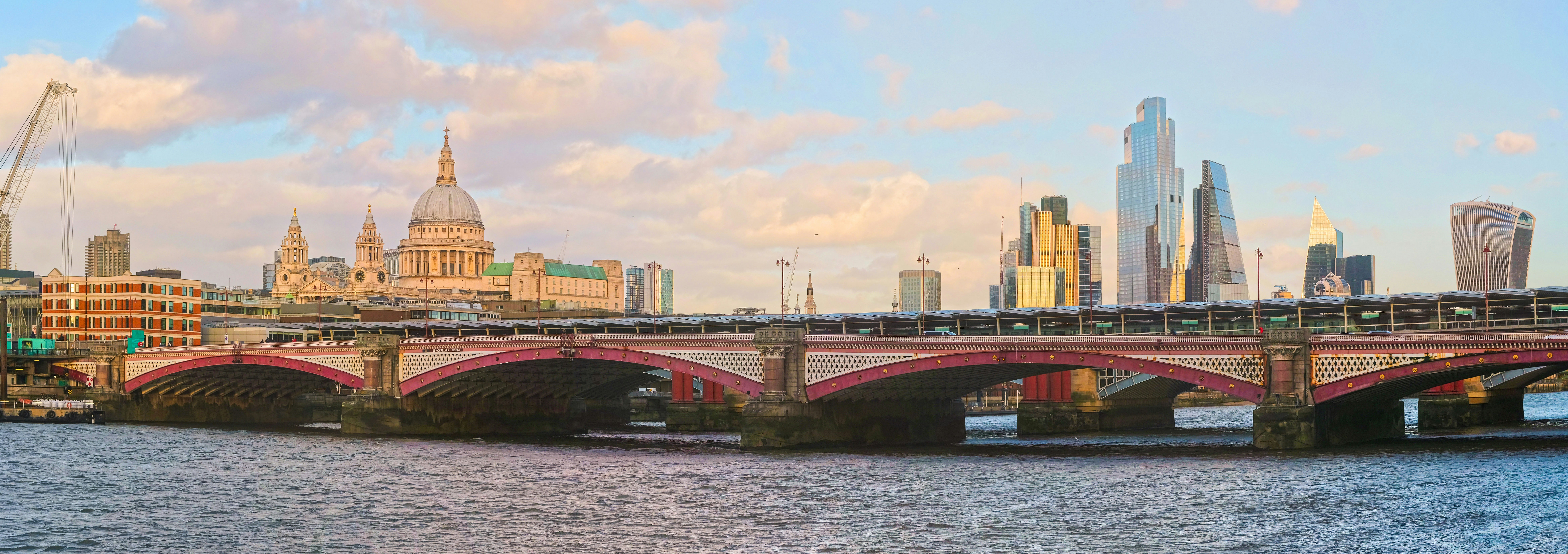 brown bridge over river during daytime