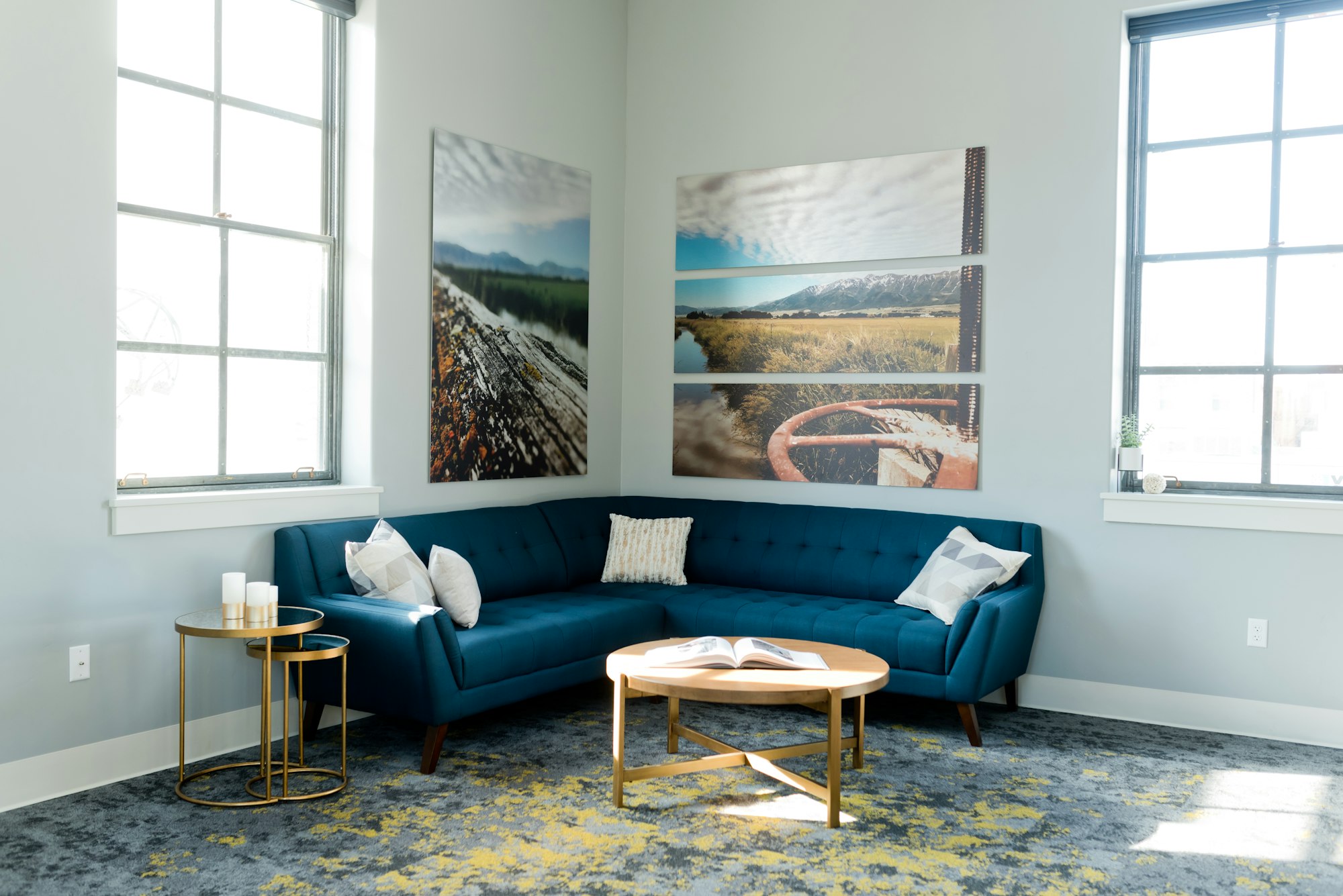 Blue couch in a pale blue room