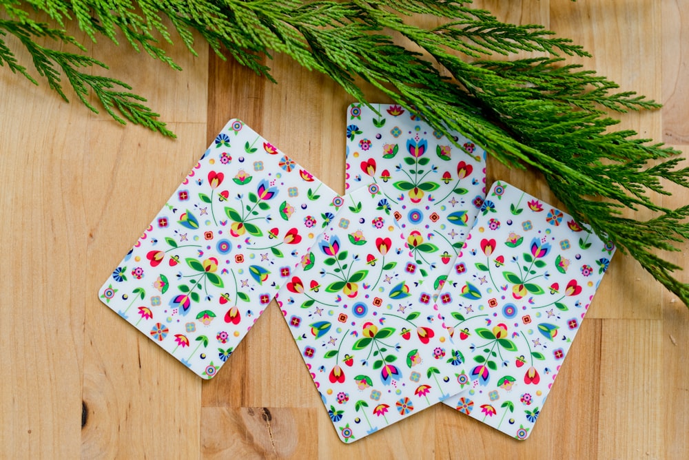 white red and green floral textile