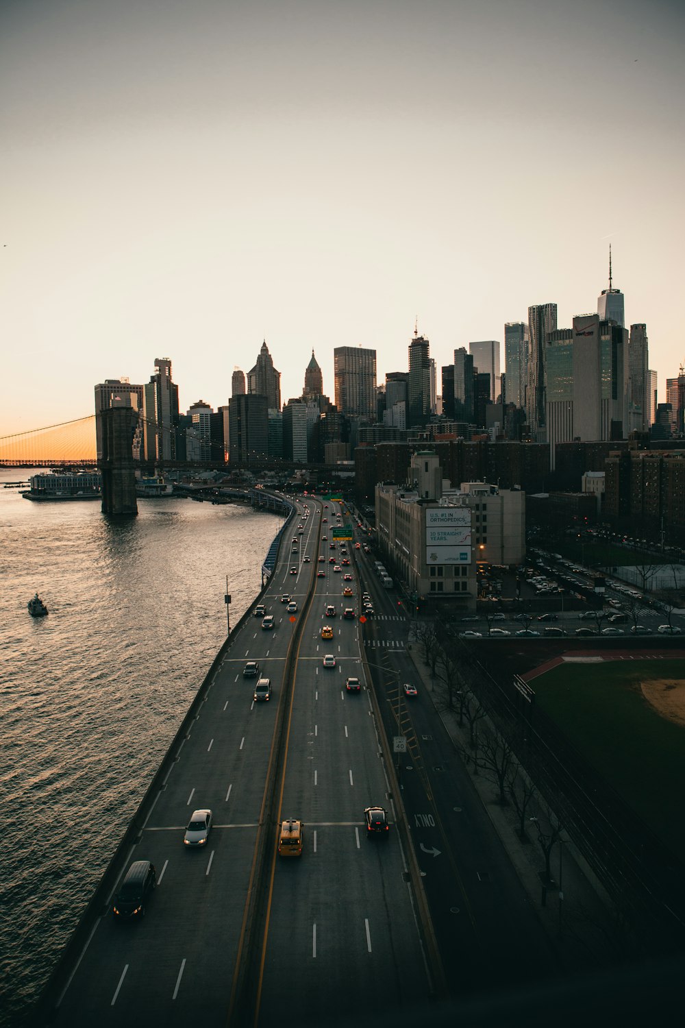 city buildings near body of water during daytime