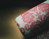red and white floral textile