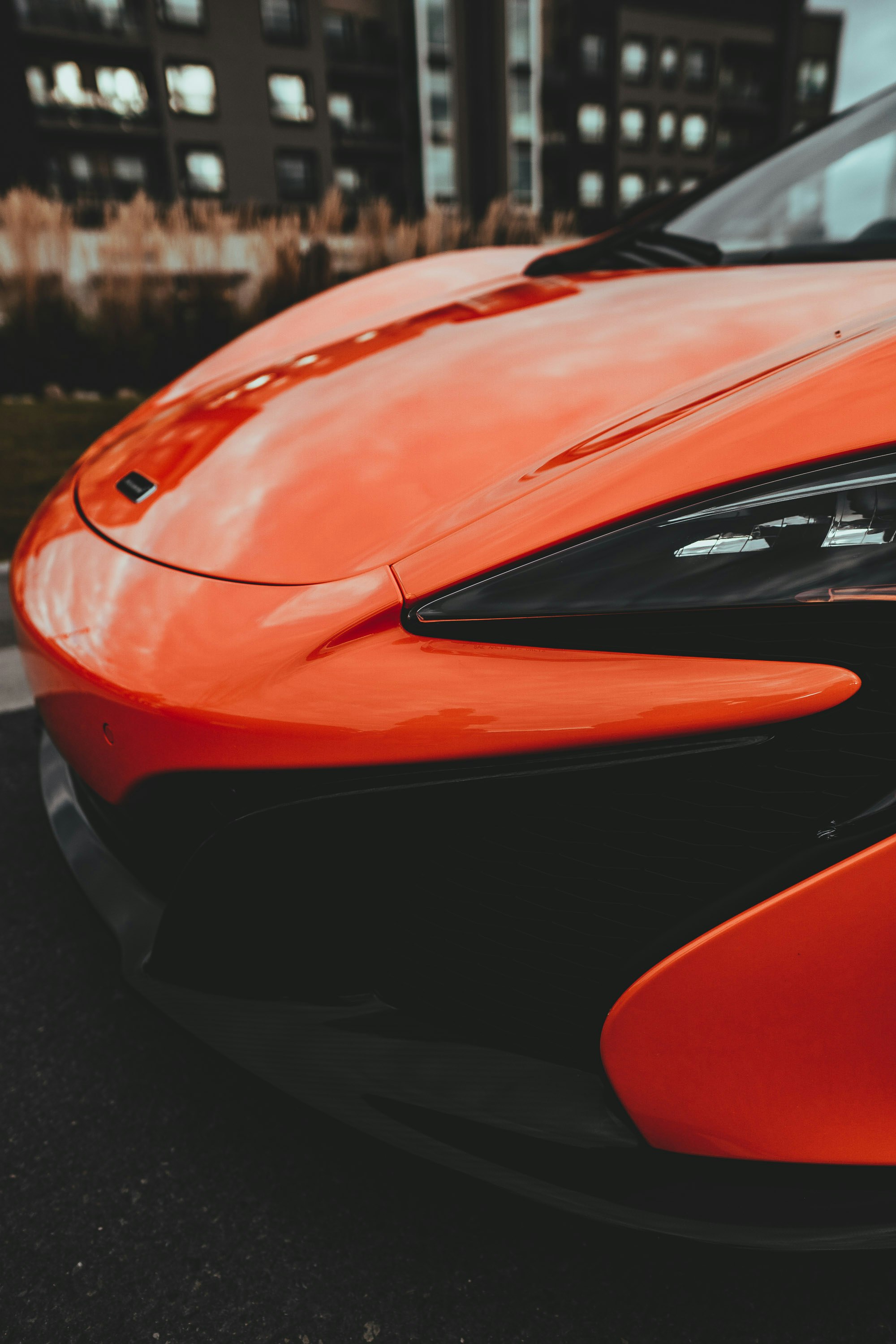 red ferrari car on road during daytime