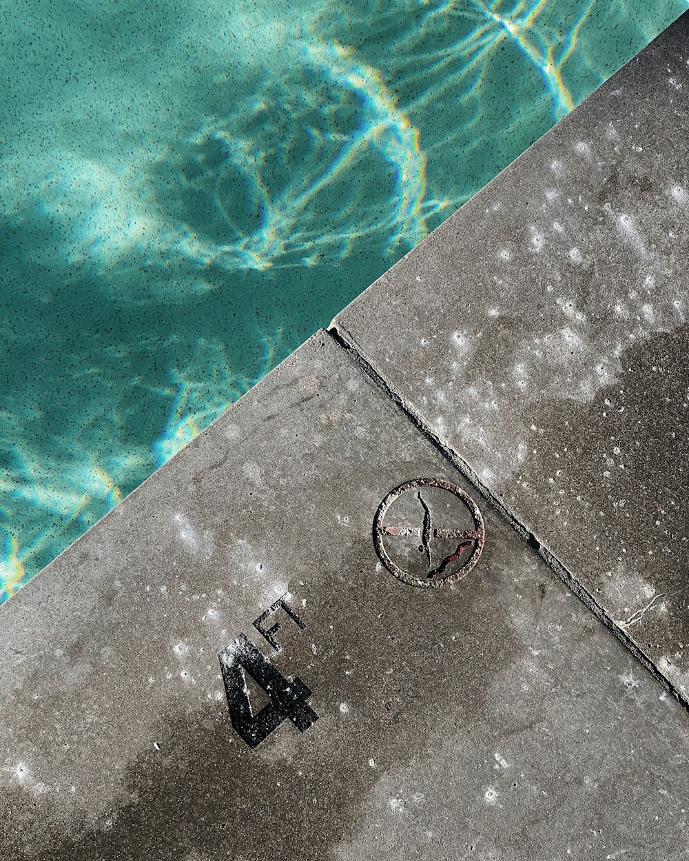 black metal tool on grey concrete surface