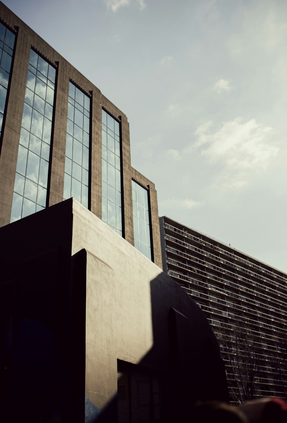 brown concrete building under white sky during daytime