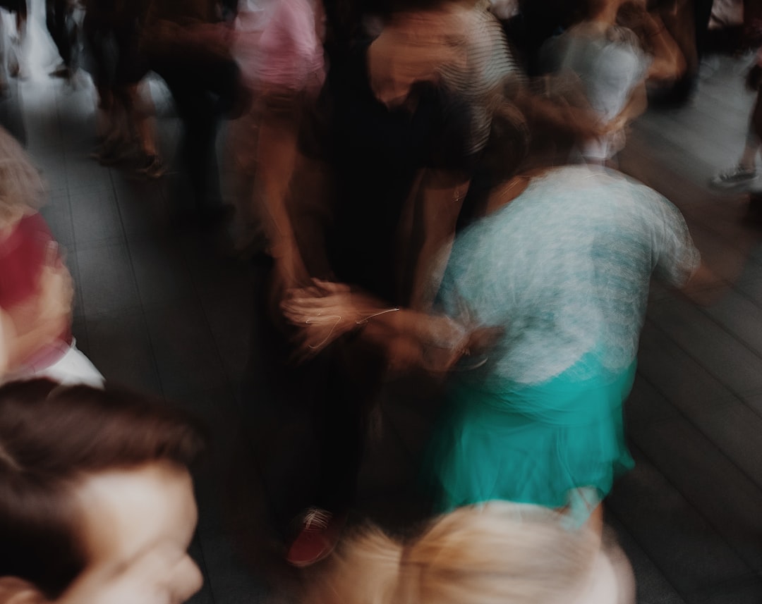 people standing on gray floor tiles