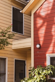 red brick wall with white round ceiling lamp
