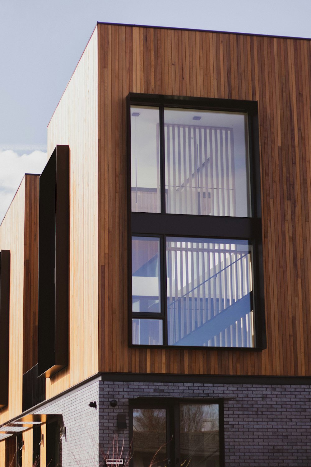 brown wooden framed glass window