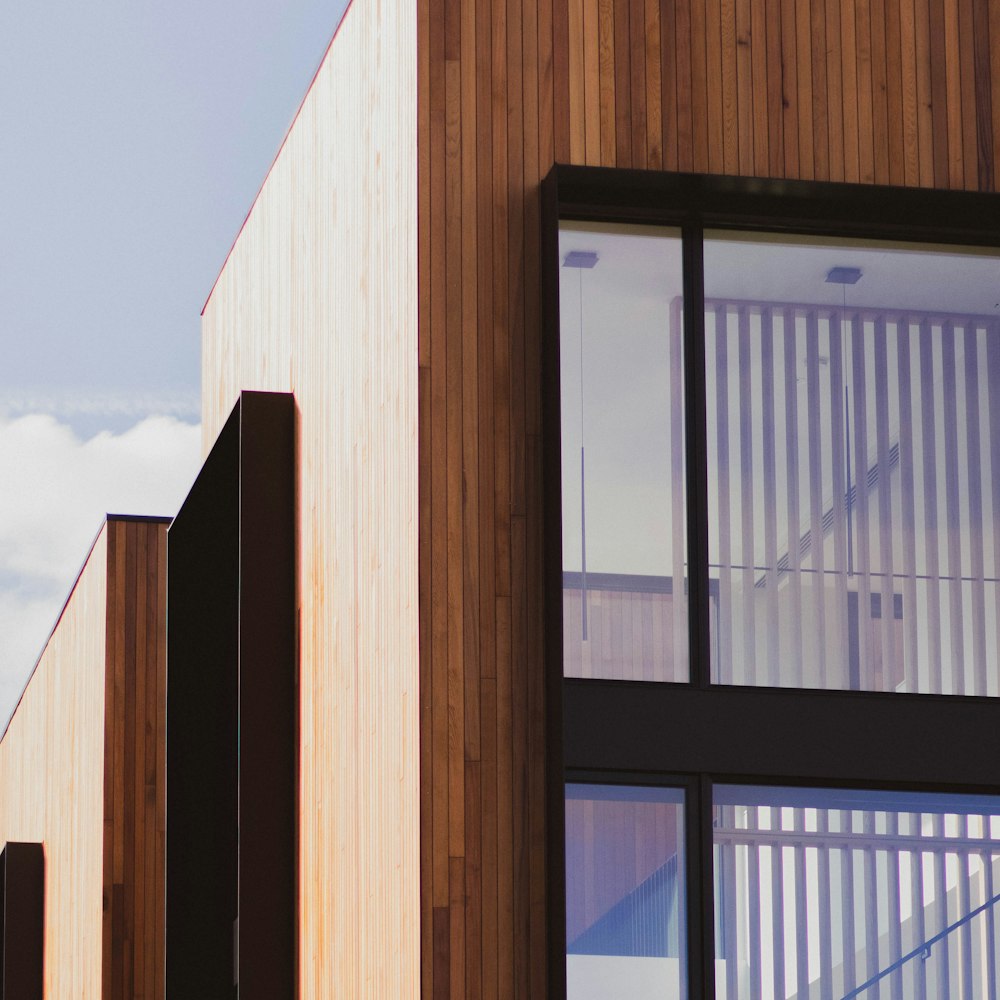 brown wooden wall under blue sky during daytime