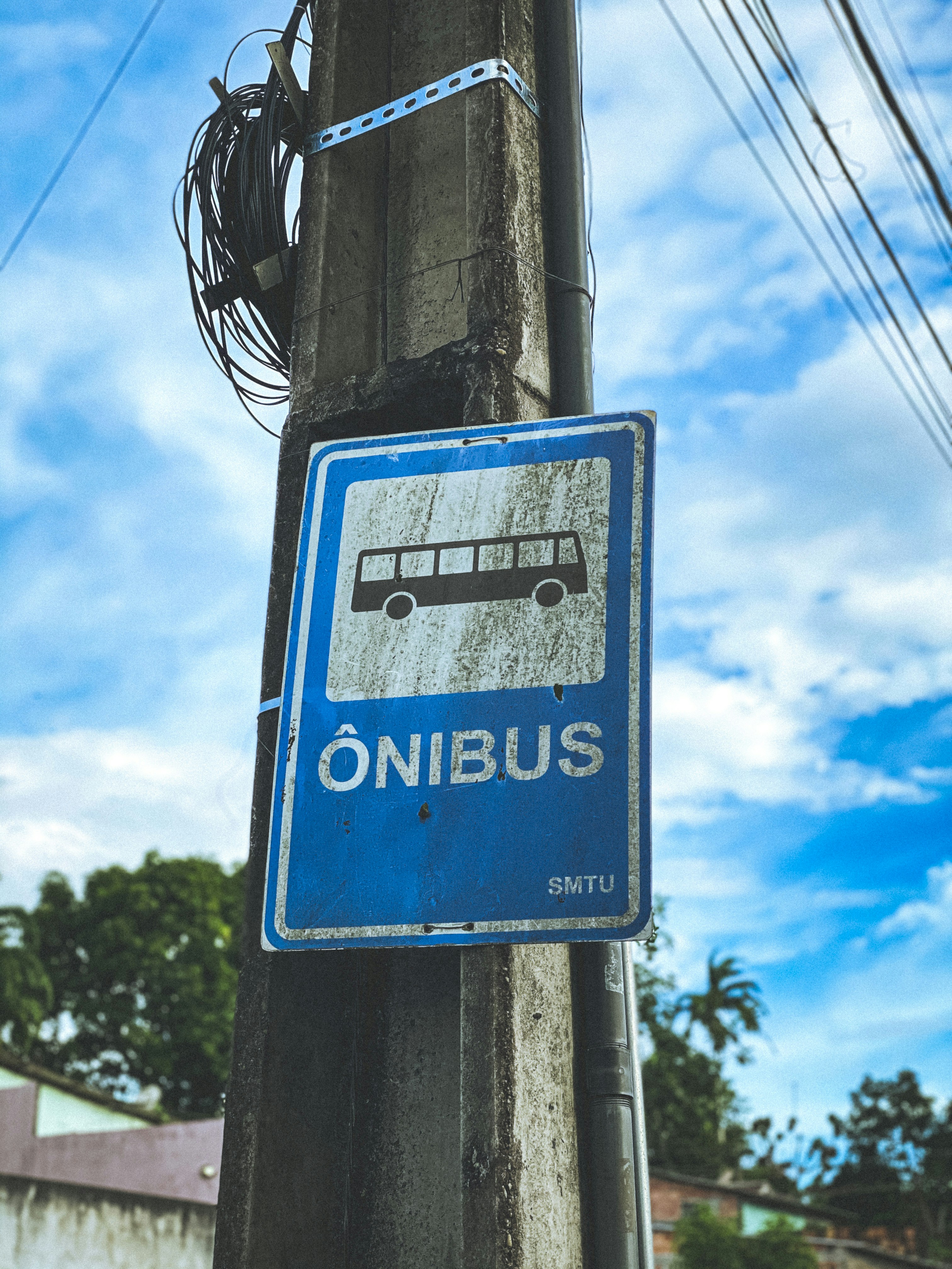 blue and white UNK street sign