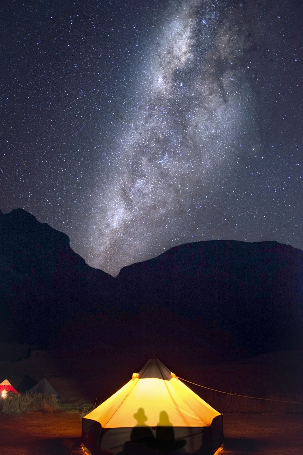brown tent under starry night