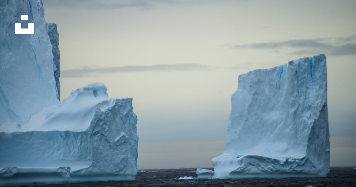 White rock formation on sea during daytime photo – Free Antarctica ...