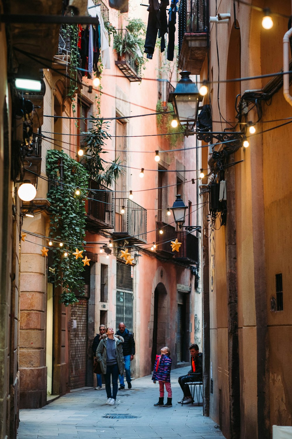 people walking on street during night time