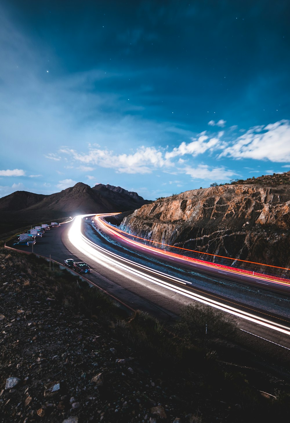 time lapse photography of cars on road during night time