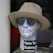 A mannequin head is covered in a map of the New York subway system, wearing a beige hat and sunglasses. The words 'New York Subway' are prominently displayed on the neck area. The background is dark and neutral.