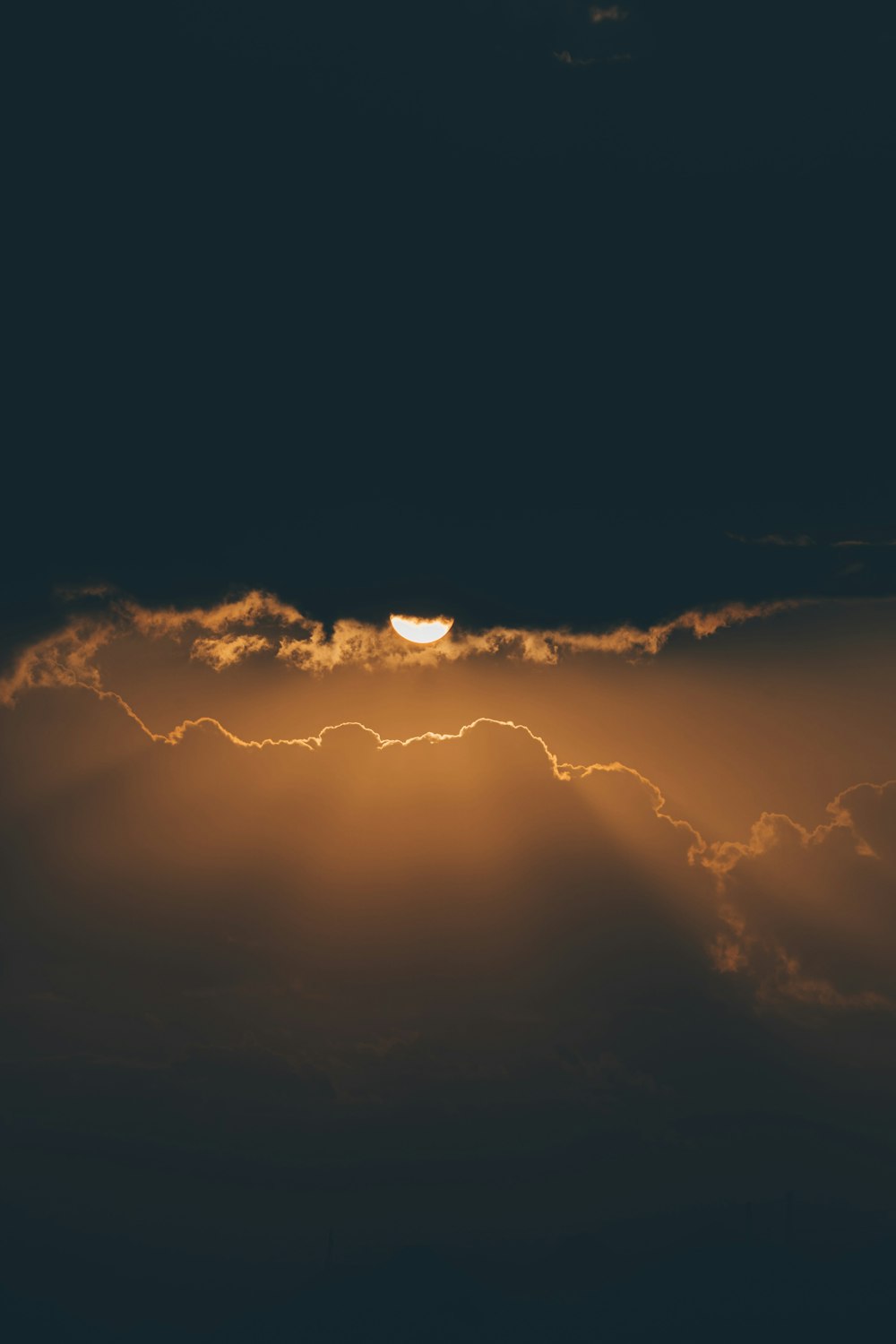 orange and black clouds during sunset