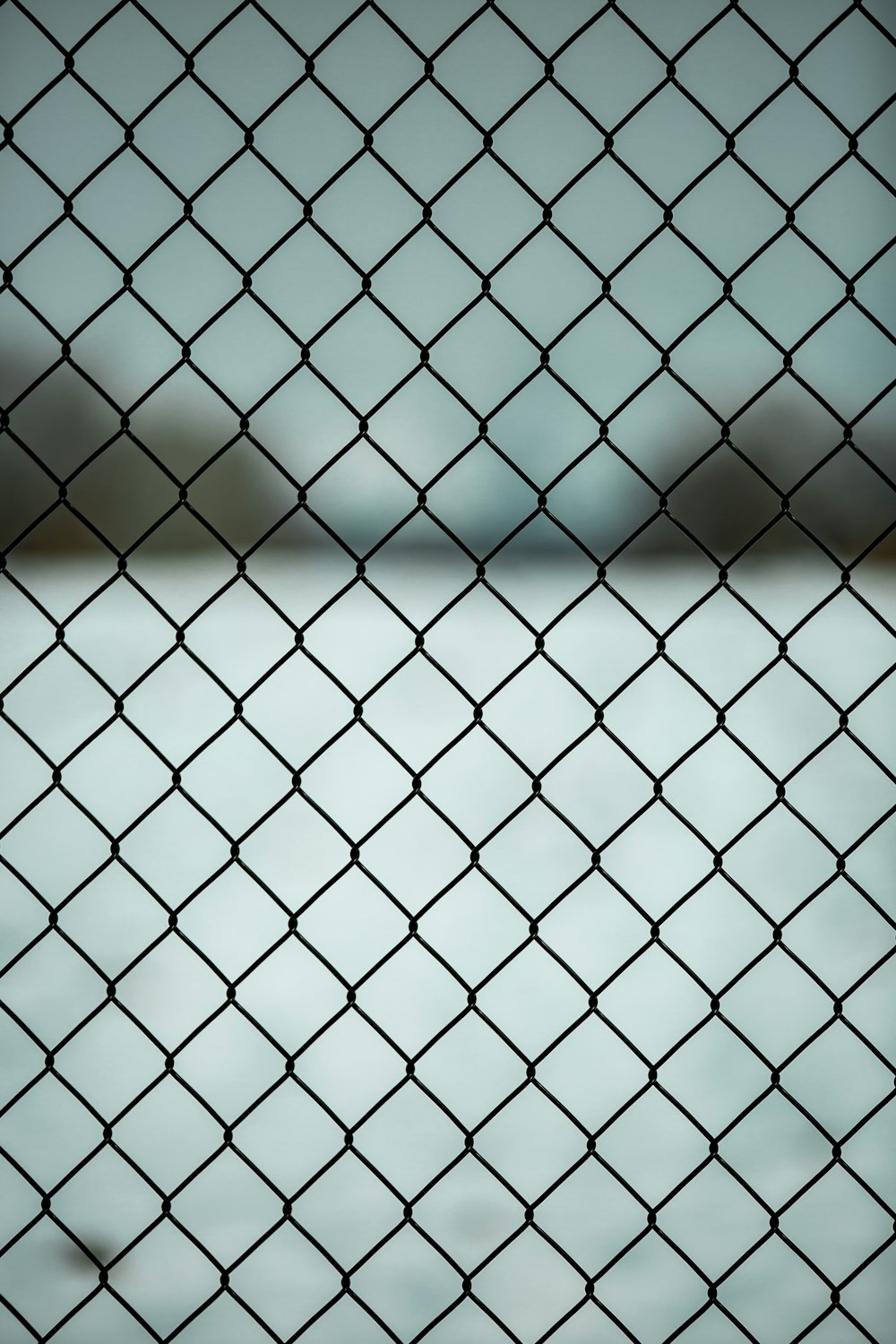 a close up of a chain link fence