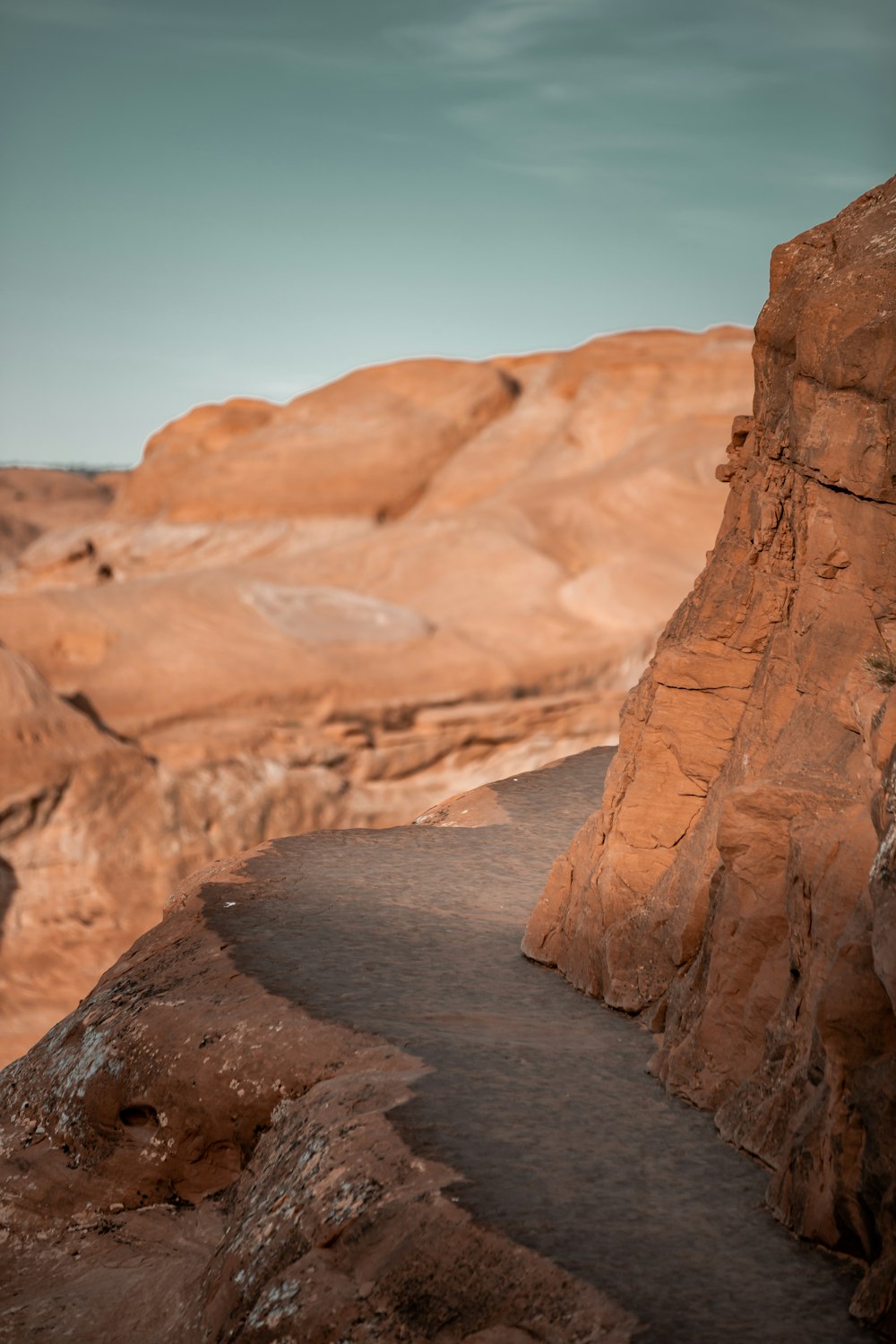 brown rock formation under blue sky during daytime