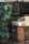 A bathroom setting is visible, featuring a white ceramic basin on a wooden cabinet. There is a large, leafy green plant beside the cabinet. Reflections on the glass suggest this is a window display, with outdoor elements visible, such as trees and a pavement.