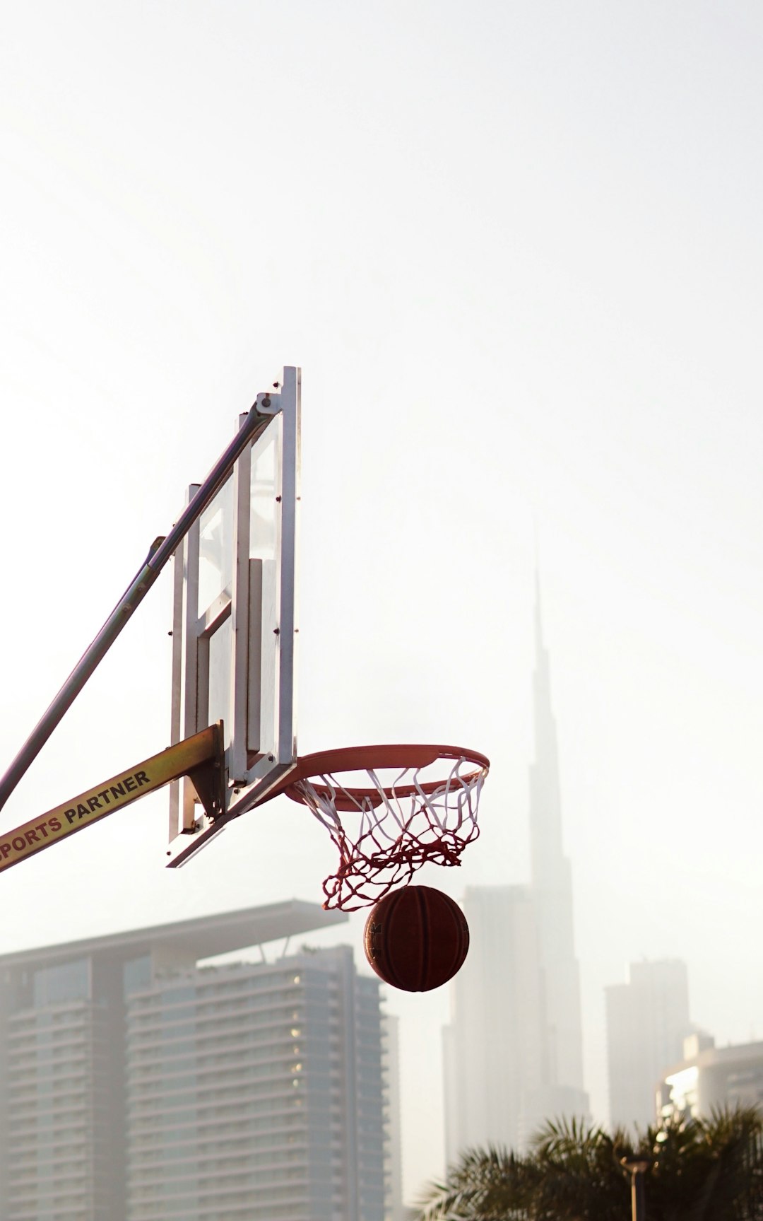 basketball hoop under white sky
