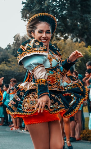 woman in red and gold traditional dress