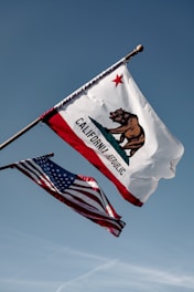 us a flag under blue sky during daytime