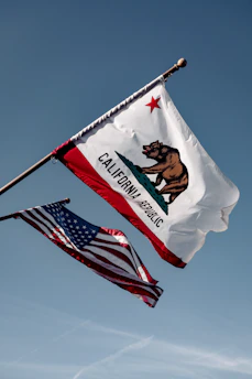us a flag under blue sky during daytime