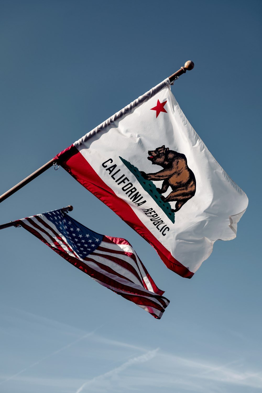 us a flag under blue sky during daytime