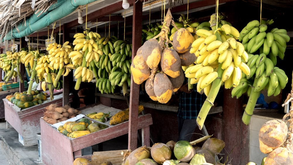 banana fruit on brown wooden shelf