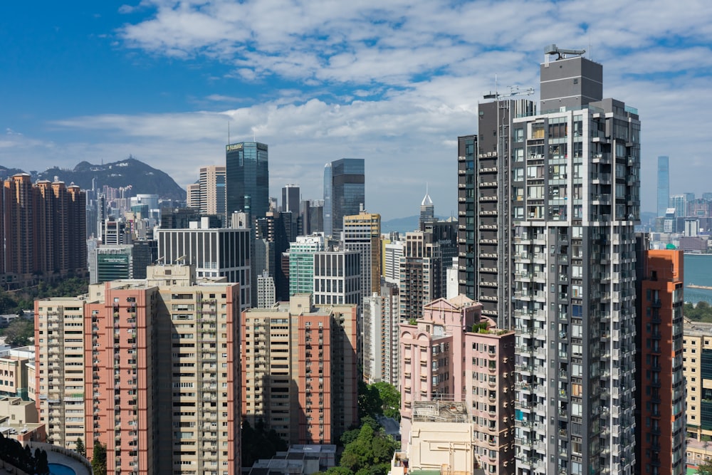 city buildings under blue sky during daytime