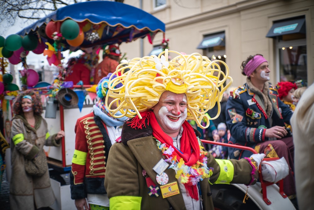 woman in yellow wig and green jacket