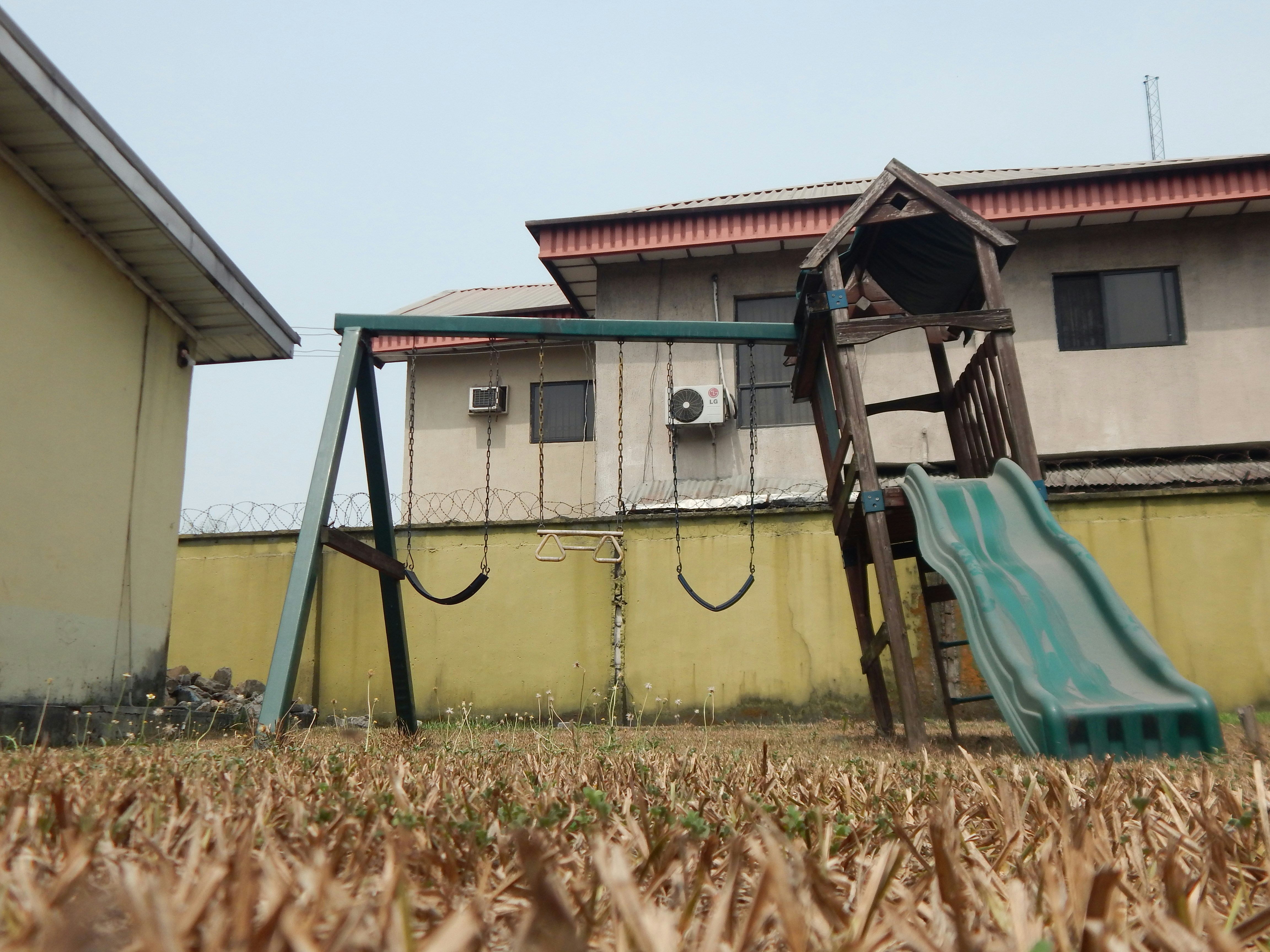 blue and brown wooden swing